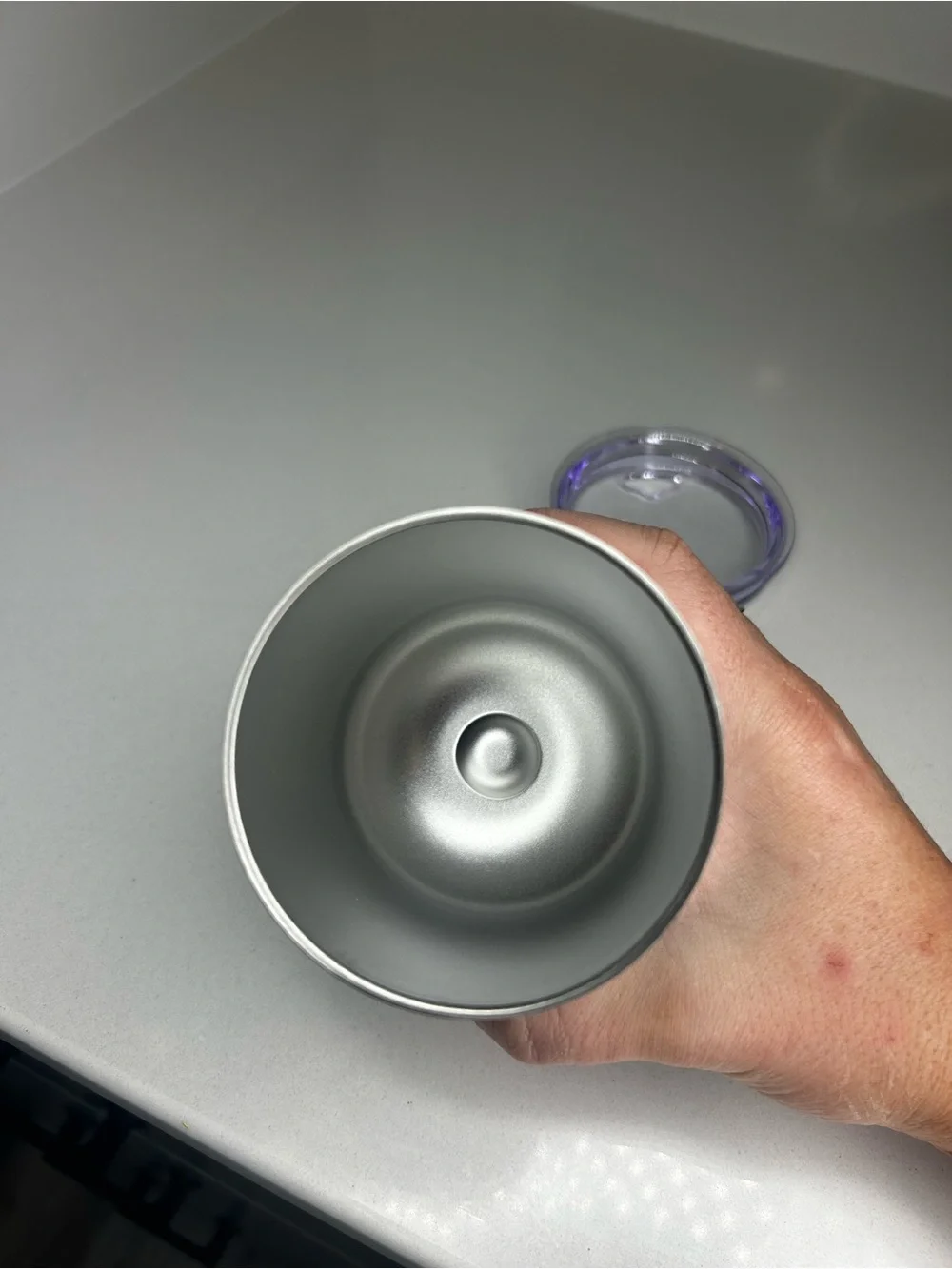 Dolly Parton keeps tumbler clean